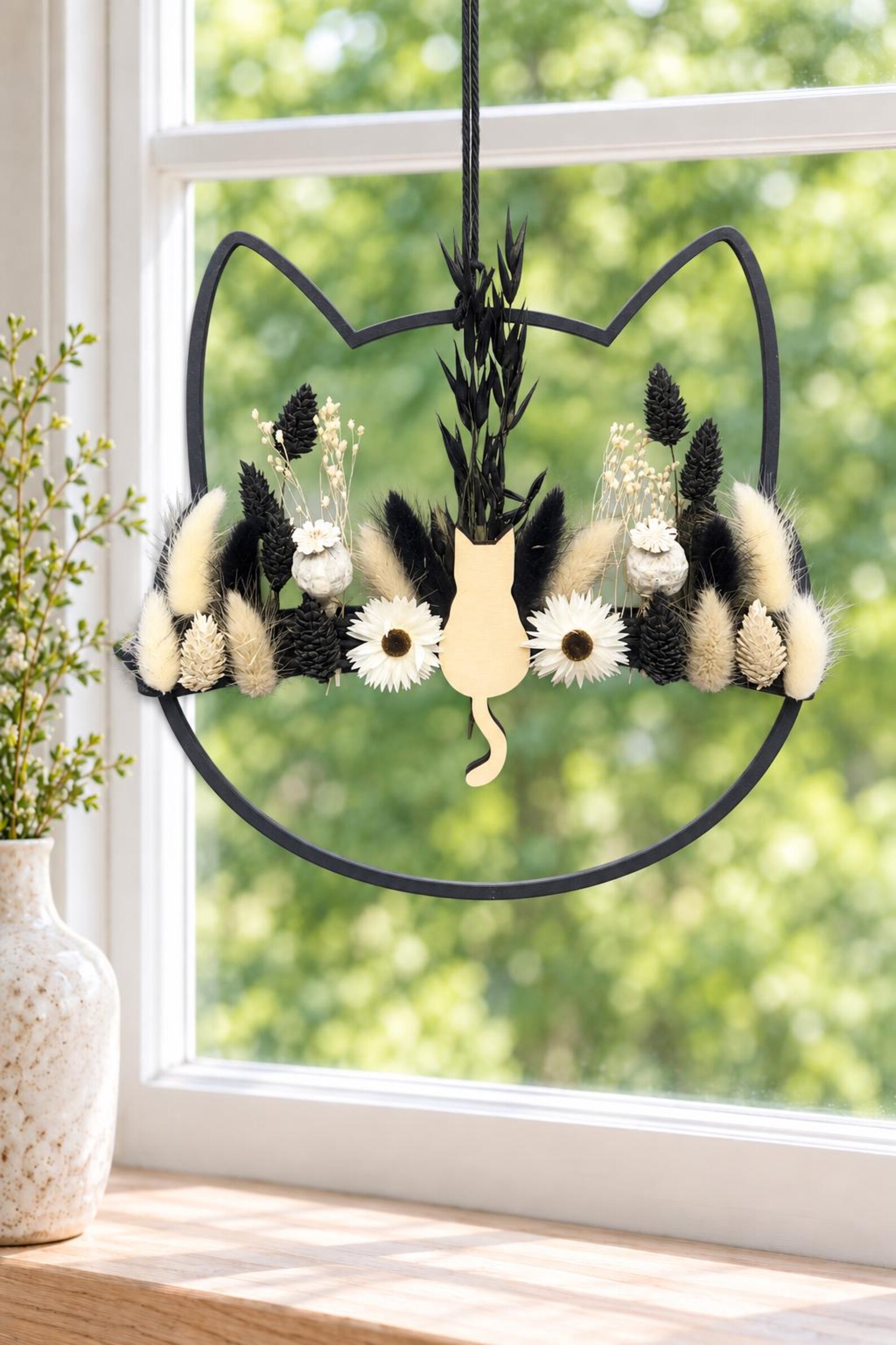 Katze Trockenblumen